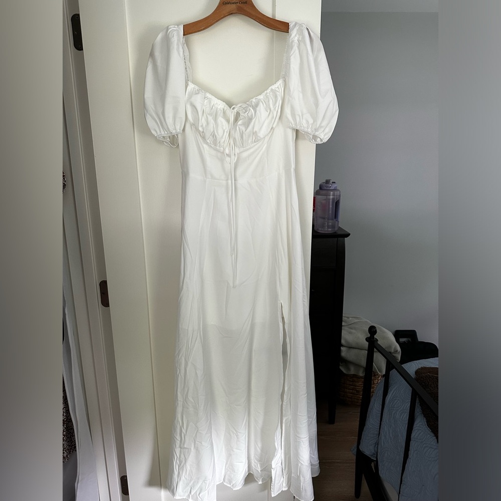 White off the shoulder zip up dress with slit in the leg
